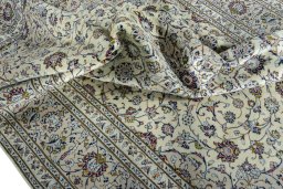 Surface texture of 2000s Kashan rug with natural Wool and intricate pattern