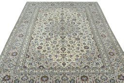 Surface texture of 2000s Kashan rug with natural Wool and intricate pattern