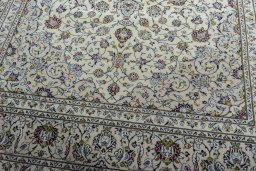 Close-up detail of 2000s Kashan rug from Iran / Persia showing Wool weave