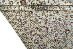 Close-up detail of 2000s Kashan rug from Iran / Persia showing Wool weave