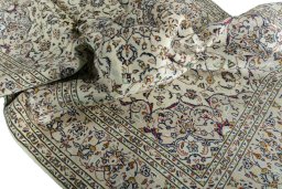 Surface texture of 2000s Kashan rug with natural Wool and intricate pattern