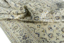 Surface texture of New Kashan rug with natural Wool and intricate pattern