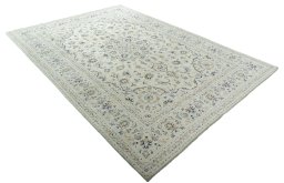 Close-up detail of New Kashan rug from Iran / Persia showing Wool weave