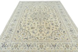 Surface texture of New Kashan rug with natural Wool and intricate pattern