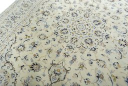Backside of handmade New Kashan rug showing knot structure and weave density