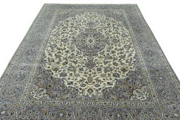 Surface texture of 2000s Kashan rug with natural Wool and intricate pattern