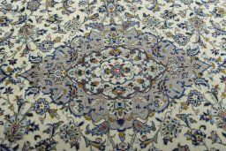 Central medallion detail of 2000s Kashan rug from Iran / Persia