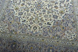 Close-up detail of 2000s Kashan rug from Iran / Persia showing Wool weave