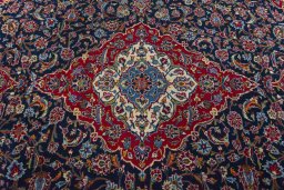 Central medallion detail of 2000s Kashan rug from Iran / Persia