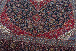 Close-up detail of 2000s Kashan rug from Iran / Persia showing Wool weave