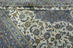 Close-up detail of 2000s Kashan rug from Iran / Persia showing Wool weave