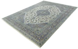 Corner detail of 2000s Kashan rug showing border pattern and Wool pile