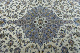 Central medallion detail of 2000s Kashan rug from Iran / Persia