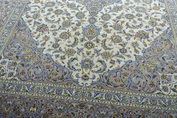 Close-up detail of 2000s Kashan rug from Iran / Persia showing Wool weave