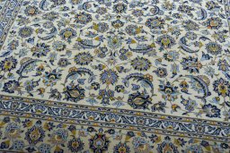 Close-up detail of 2000s Kashan rug from Iran / Persia showing Wool weave