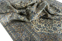 Surface texture of 2000s Kashan rug with natural Wool and intricate pattern