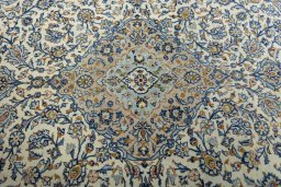 Central medallion detail of 2000s Kashan rug from Iran / Persia