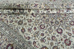 Close-up detail of 2000s Kashan rug from Iran / Persia showing Wool weave