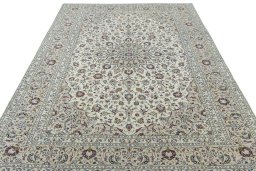 Surface texture of 2000s Kashan rug with natural Wool and intricate pattern