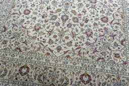 Close-up detail of 2000s Kashan rug from Iran / Persia showing Wool weave