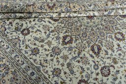 Close-up detail of 2000s Kashan rug from Iran / Persia showing Wool weave