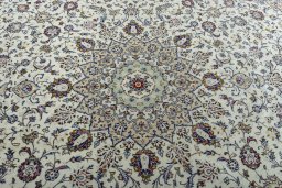 Central medallion detail of 2000s Kashan rug from Iran / Persia
