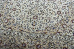 Close-up detail of 2000s Kashan rug from Iran / Persia showing Wool weave