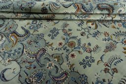 Close-up detail of 2000s Kashan rug from Iran / Persia showing Wool weave