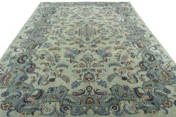 Surface texture of 2000s Kashan rug with natural Wool and intricate pattern