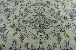 Central medallion detail of 2000s Kashan rug from Iran / Persia