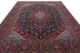 Surface texture of 2000s Kashan rug with natural Wool and intricate pattern