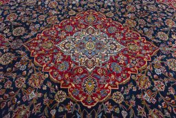 Central medallion detail of 2000s Kashan rug from Iran / Persia