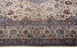 Corner detail of 1930s Kashan rug showing border pattern and Wool pile