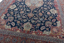 Close-up detail of 1930s Kashan rug from Iran / Persia showing Wool weave