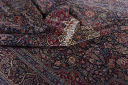 Surface texture of 1930s Kashan rug with natural Wool and intricate pattern