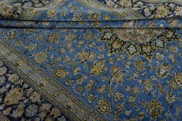 Close-up detail of 2000s Kashan rug from Iran / Persia showing Wool weave