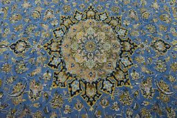 Central medallion detail of 2000s Kashan rug from Iran / Persia