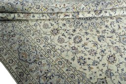 Close-up detail of 2000s Kashan rug from Iran / Persia showing Wool weave