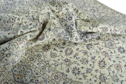 Surface texture of 2000s Kashan rug with natural Wool and intricate pattern