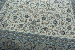 Close-up detail of 2000s Kashan rug from Iran / Persia showing Wool weave