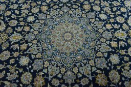 Central medallion detail of 2000s Kashan rug from Iran / Persia