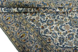 Close-up detail of 2000s Kashan rug from Iran / Persia showing Wool weave