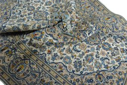 Surface texture of 2000s Kashan rug with natural Wool and intricate pattern