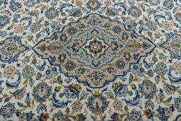 Central medallion detail of 2000s Kashan rug from Iran / Persia