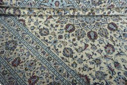 Close-up detail of 2000s Kashan rug from Iran / Persia showing Wool weave