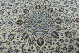 Central medallion detail of 2000s Kashan rug from Iran / Persia