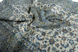 Surface texture of 2000s Kashan rug with natural Wool and intricate pattern