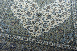 Close-up detail of 2000s Kashan rug from Iran / Persia showing Wool weave