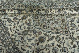 Close-up detail of 2000s Kashan rug from Iran / Persia showing Wool weave