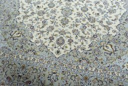 Close-up detail of 2000s Kashan rug from Iran / Persia showing Wool weave